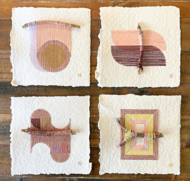 four paper artworks by Natalie Ciccoricco featuring handmade paper and thread wound around found twigs
