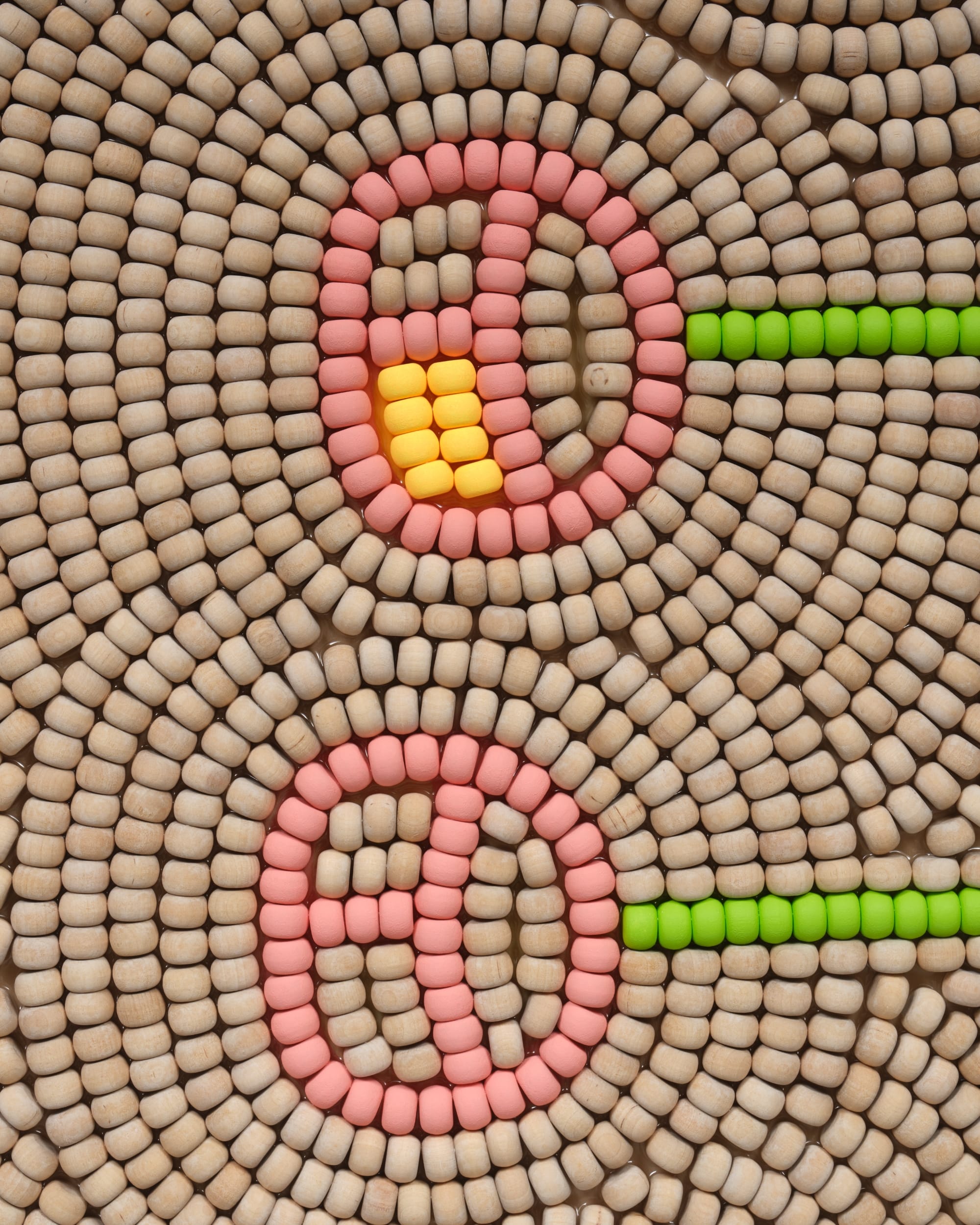 a detail of a wooden beaded work by Renee Condo of two cherry-like outlines